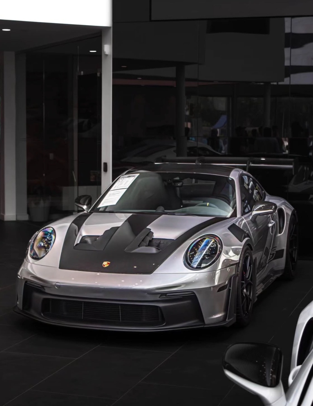 Porsche 911 GT3 RS inside luxury Porsche ATL Northeast showroom